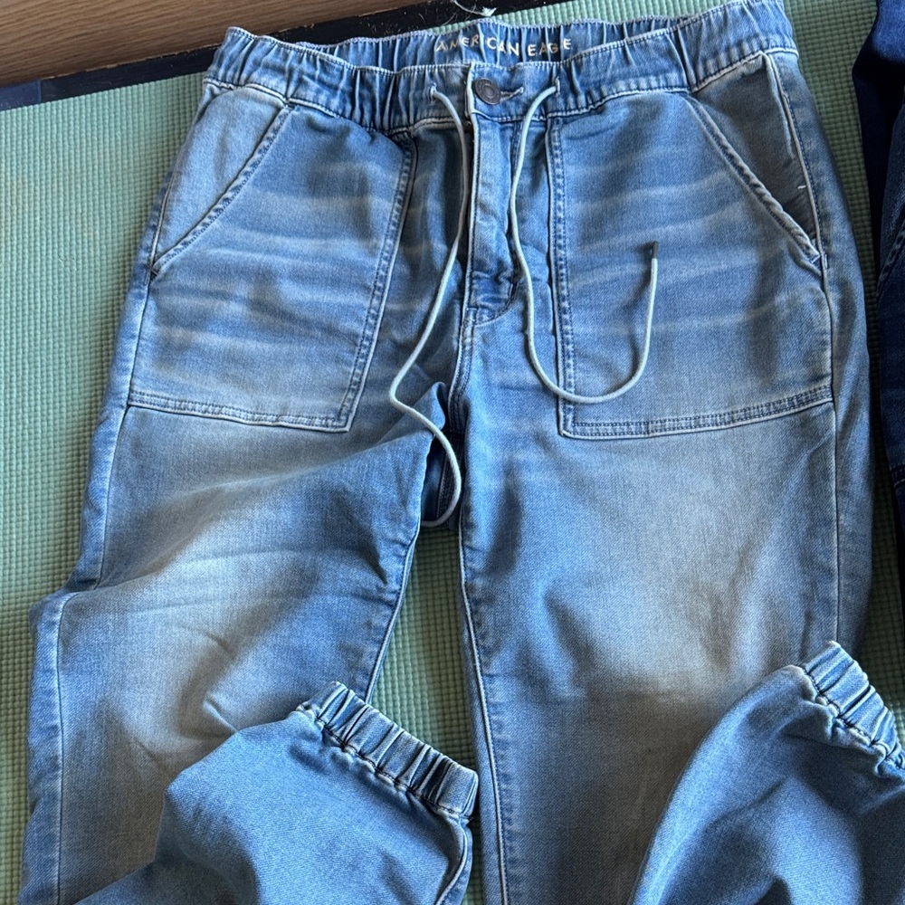 2 pairs size 12 /14 . American Eagle Women’s soft knit denim Jogger  Blue Jeans.